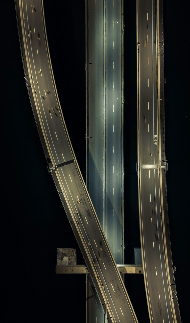 Aerial view of complex highway interchanges representing IT roadmaps and tecnical validation.