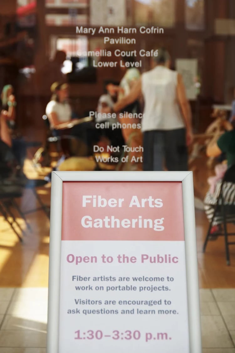 Sign at the entrance to the Fiber Arts Gathering at the Harn Museum of Art.