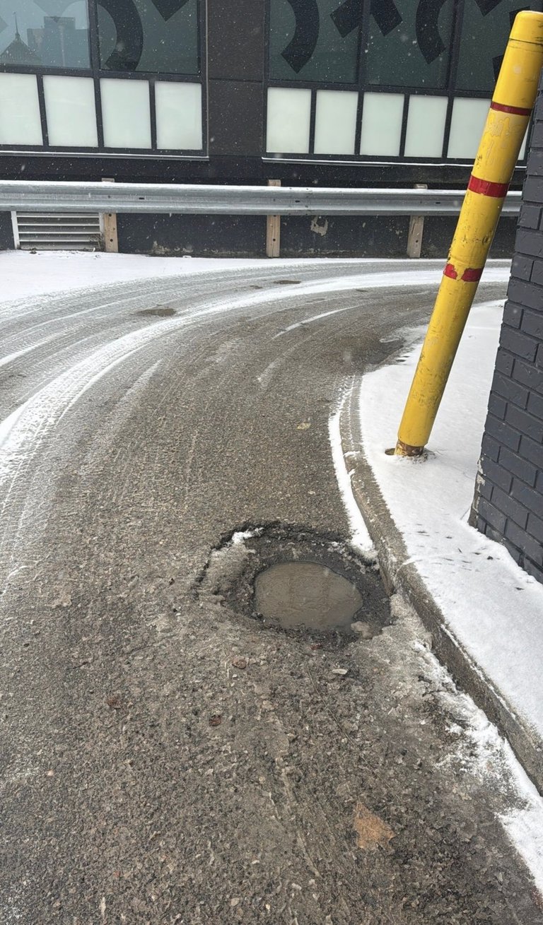 Drivethru Pothole Before Repair Was Made