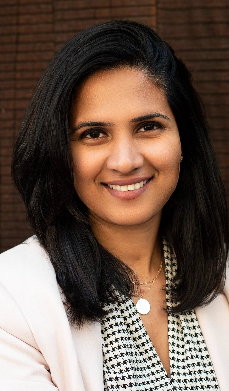 Professional headshot of Revathi Subramanian
