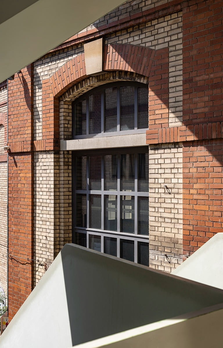 a building with a clock towering over a building