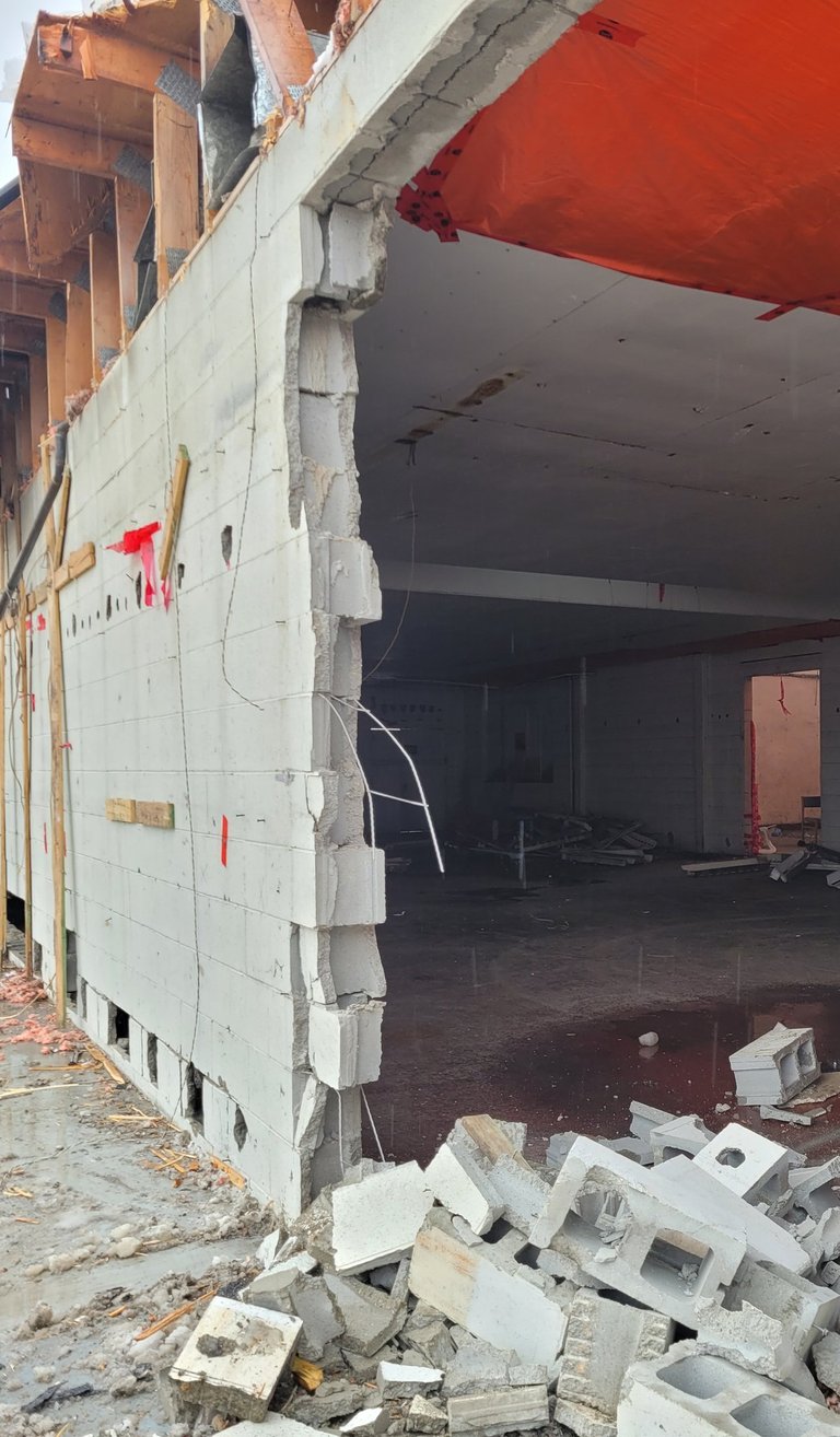 Warehouse cement brick wall damage