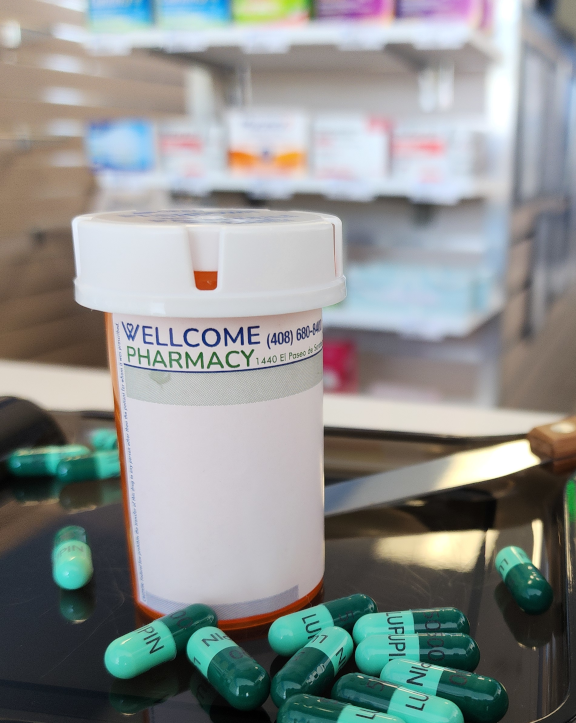 Wellcome Pharmacy prescription vial