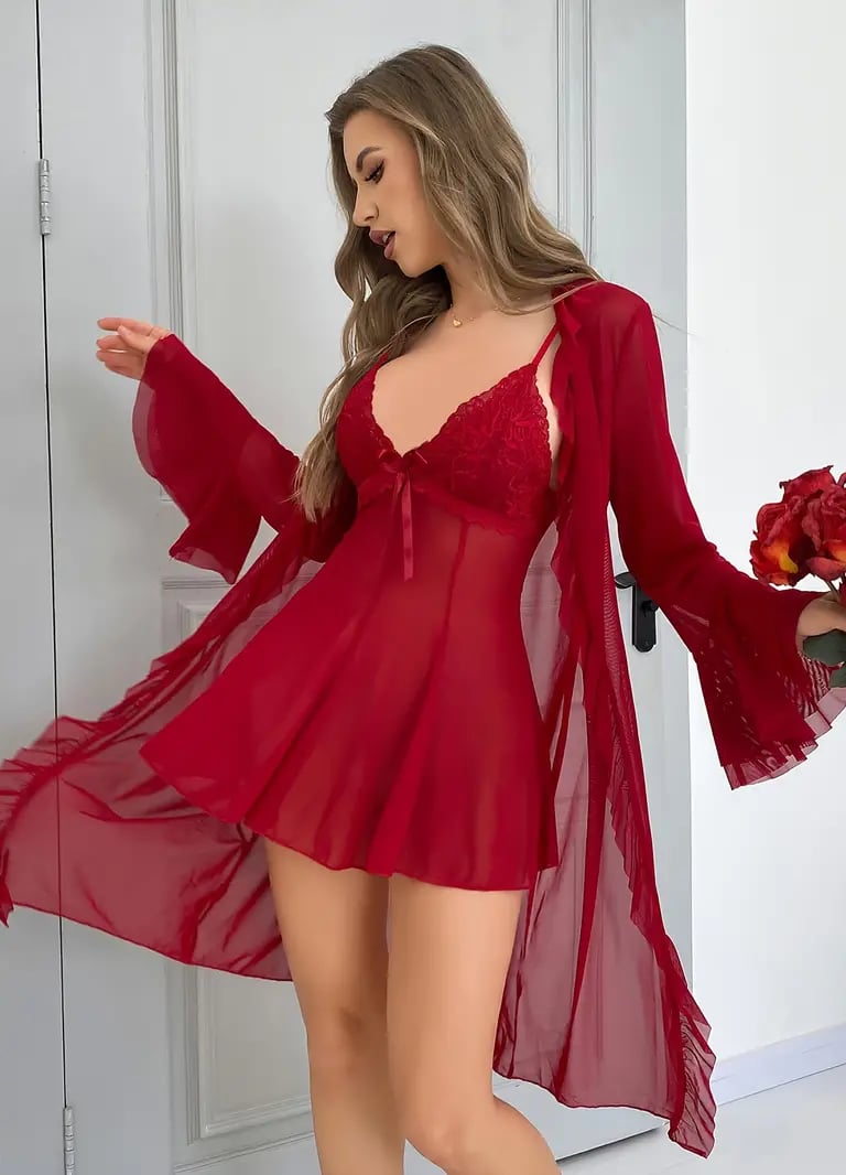 a woman in a red dress and a bouquet of flowers