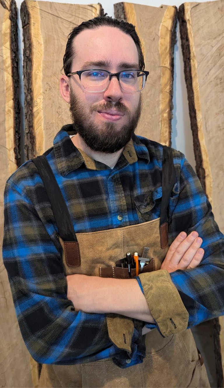 Tony Van Sant furniture maker in blue plad shirt