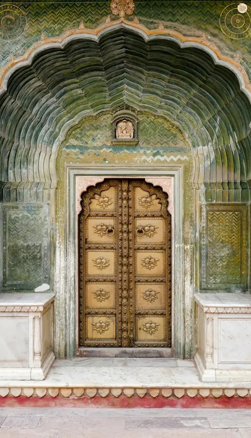 See the Spring Gate inside City Palace Jaipur, representing the spring season with vibrant floral artwork.