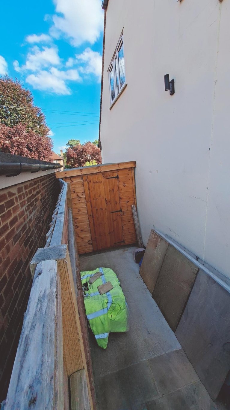www.truthincontext.co.uk Rosa and Murray Bell's new 2025 shed pushing over Myers 2023 boundary fence