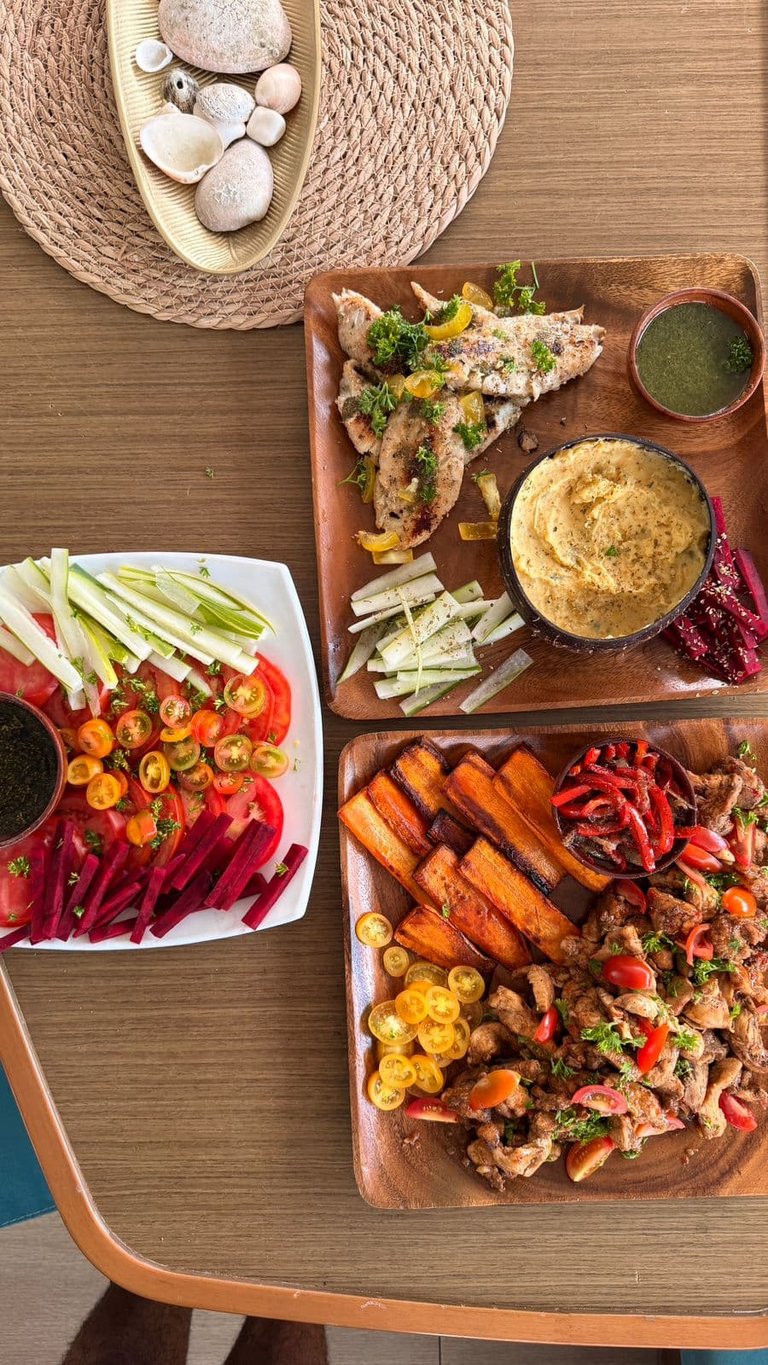 Fresh vegetable platter with hummus prepared onboard luxury catamaran in Costa Rica