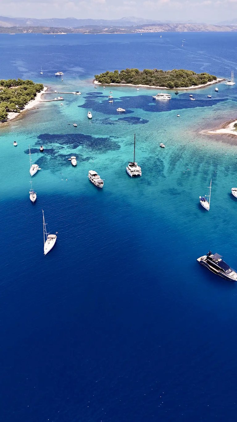 Aerial panoramic view of Blue Lagoon at Drvenik Veliki Island, seen on a private boat tour from Split, Croatia.