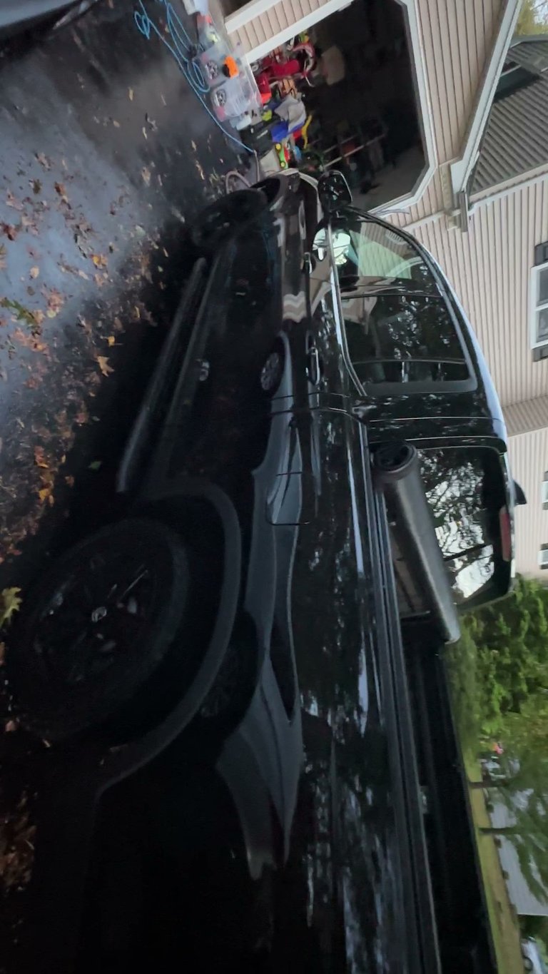 professionally detailed truck in ct, car is glossy and reflects another car