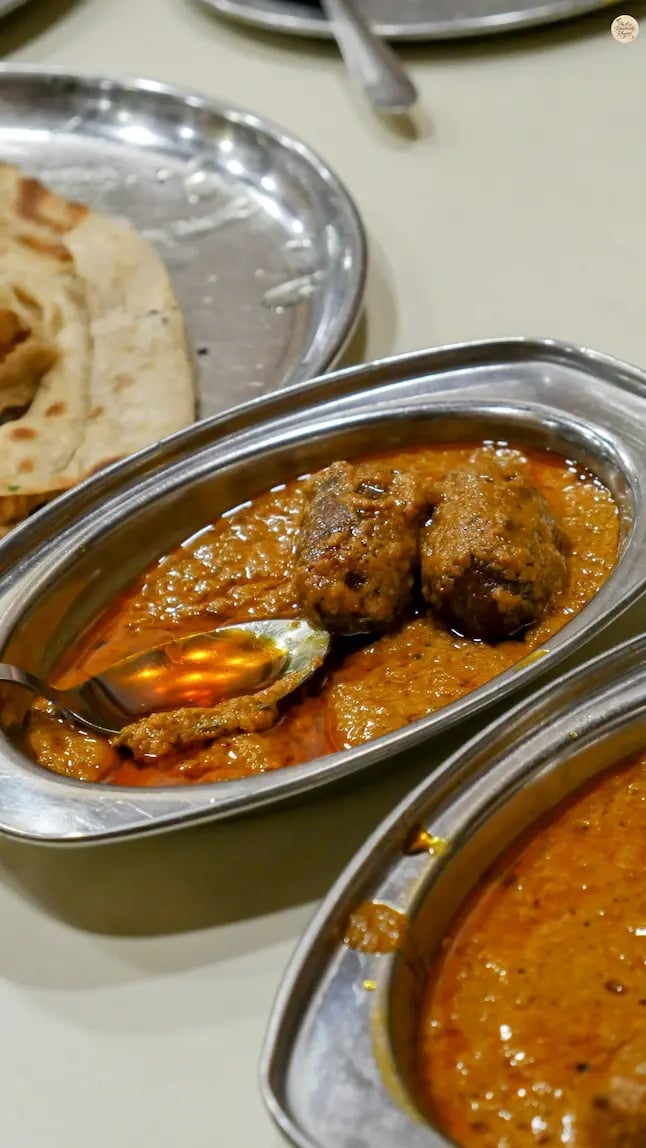 Traditional Gulab Jamun ki Sabji from Jodhpur, a unique Rajasthani curry blending sweet and spicy flavors.
