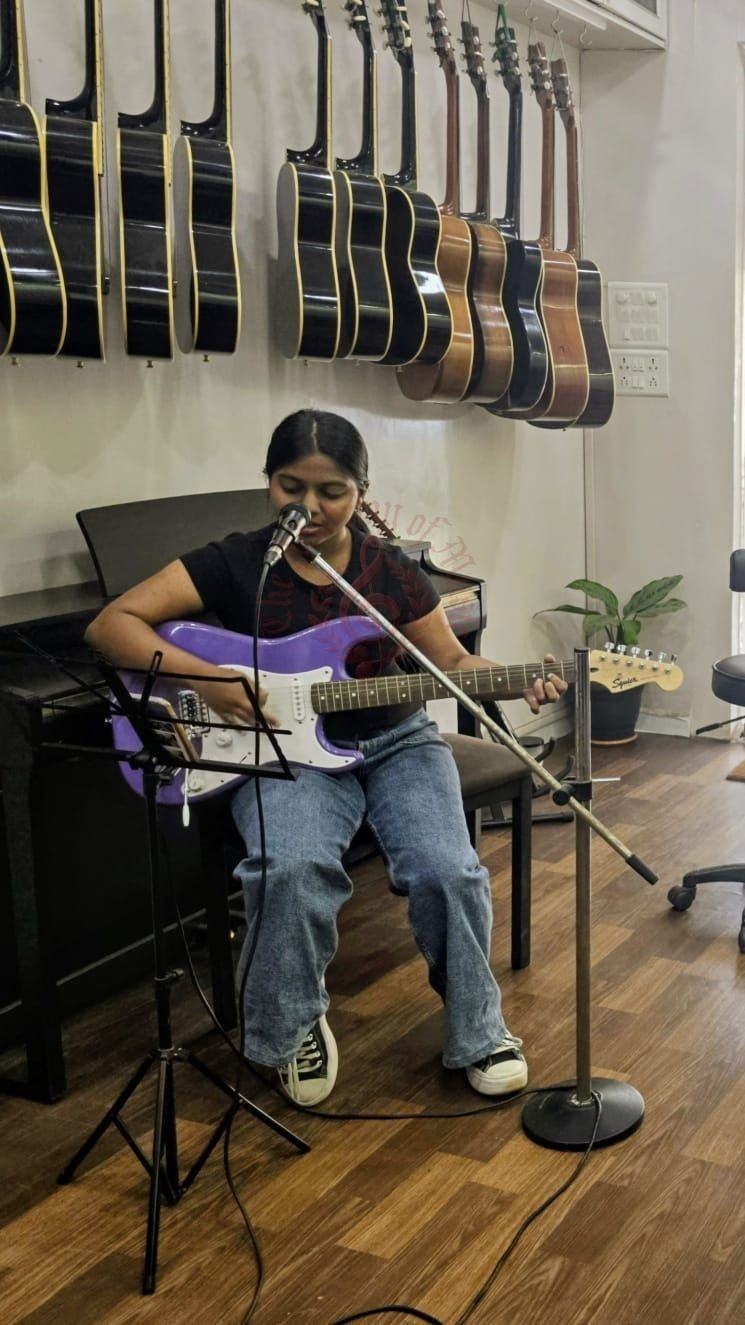 Guitar lessons and Trinity exam prep in Mumbai.