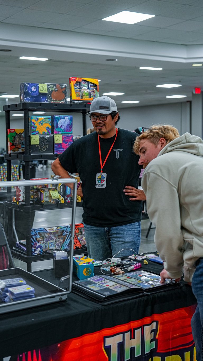 Vendor selling trading cards at the Four States Card Show in Joplin Missouri at the Joplin Expo