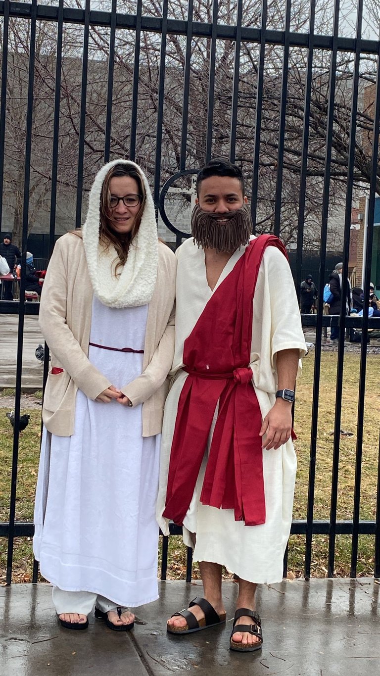 A man and woman in biblical costumes for a live nativity or religious reenactment.