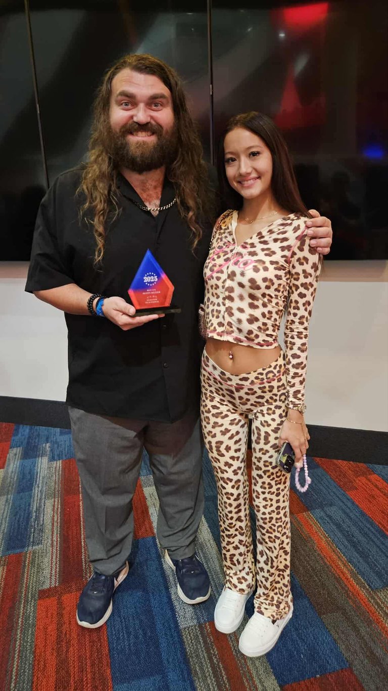 Award recipient recognized at a Fear Fame Arts Foundation supported event.