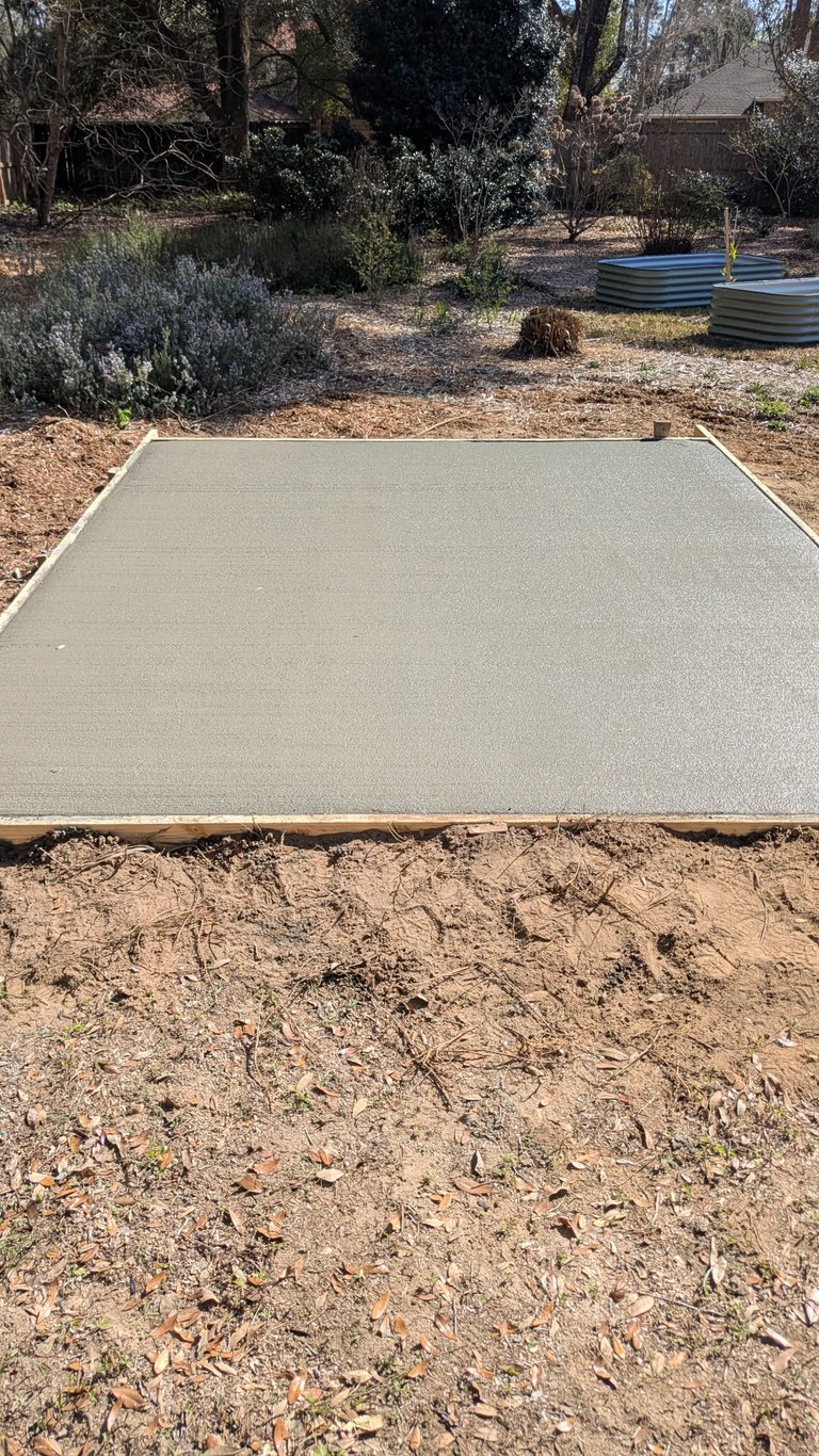 Smooth concrete slab foundation in Pensacola FL with clean professional finish