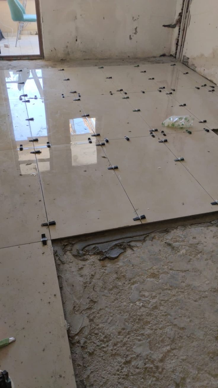 Flawless precision tiles leveling and heavy-duty GVT tiles fitting by expert contractor in Boisar.