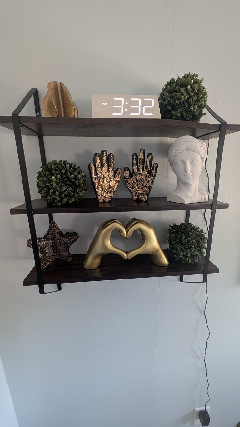 a shelf with massage therapy decor