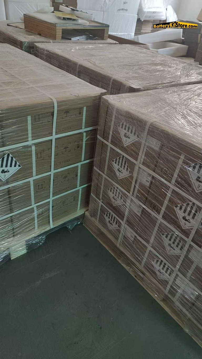lithium cells in boxes on pallets in a warehouse