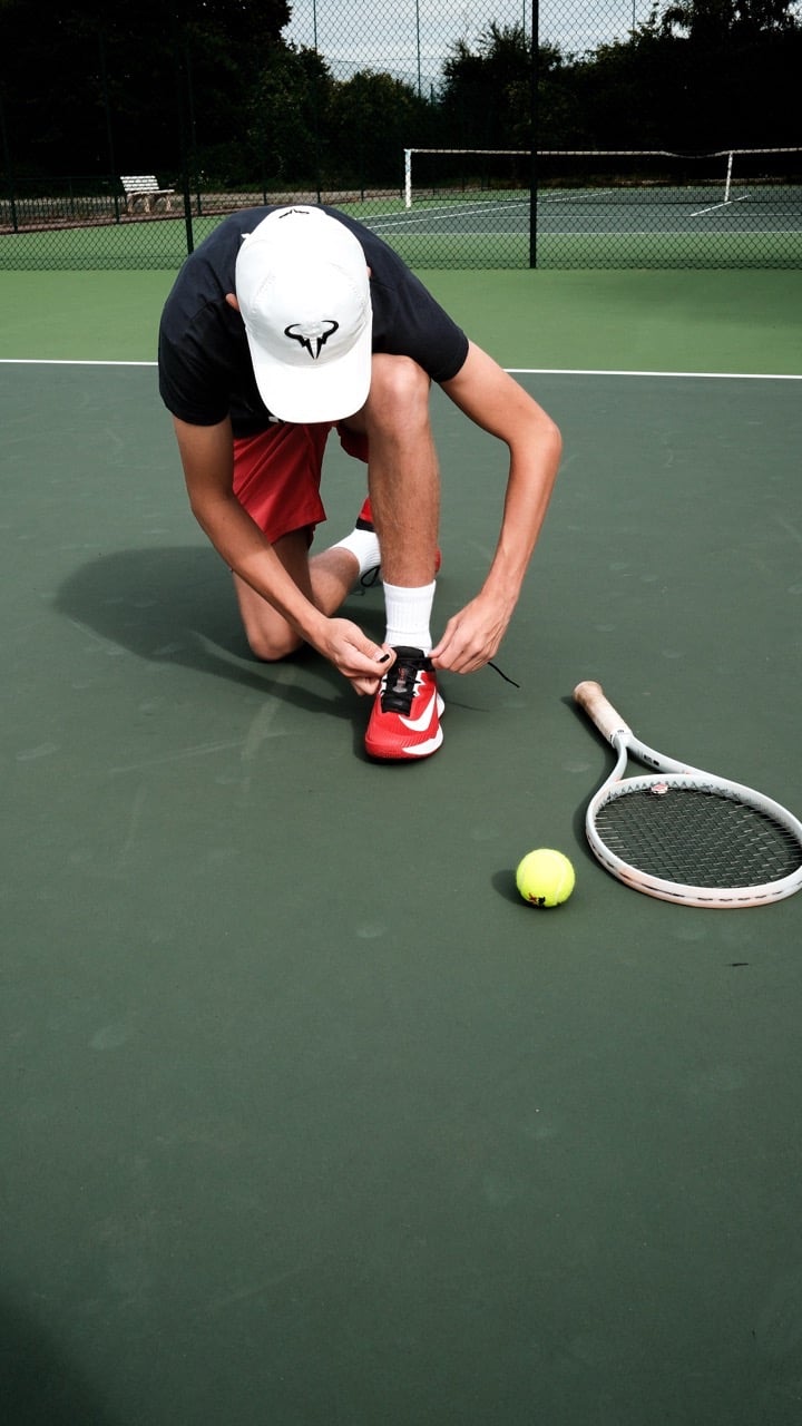 Grégoire Denis en tournoi de tennis national