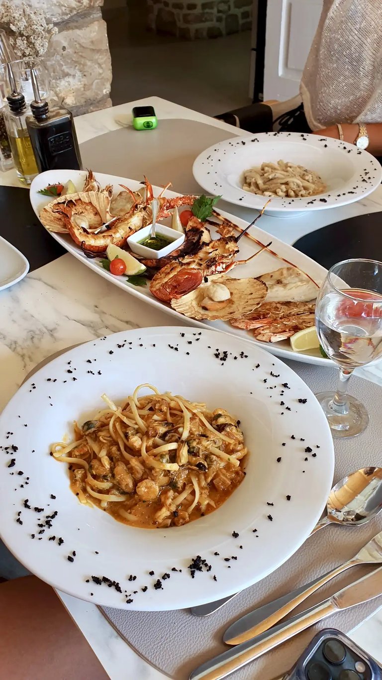 Fresh seafood platter with shrimps at Nevera restaurant on the island of Solta during boat trip from Split.