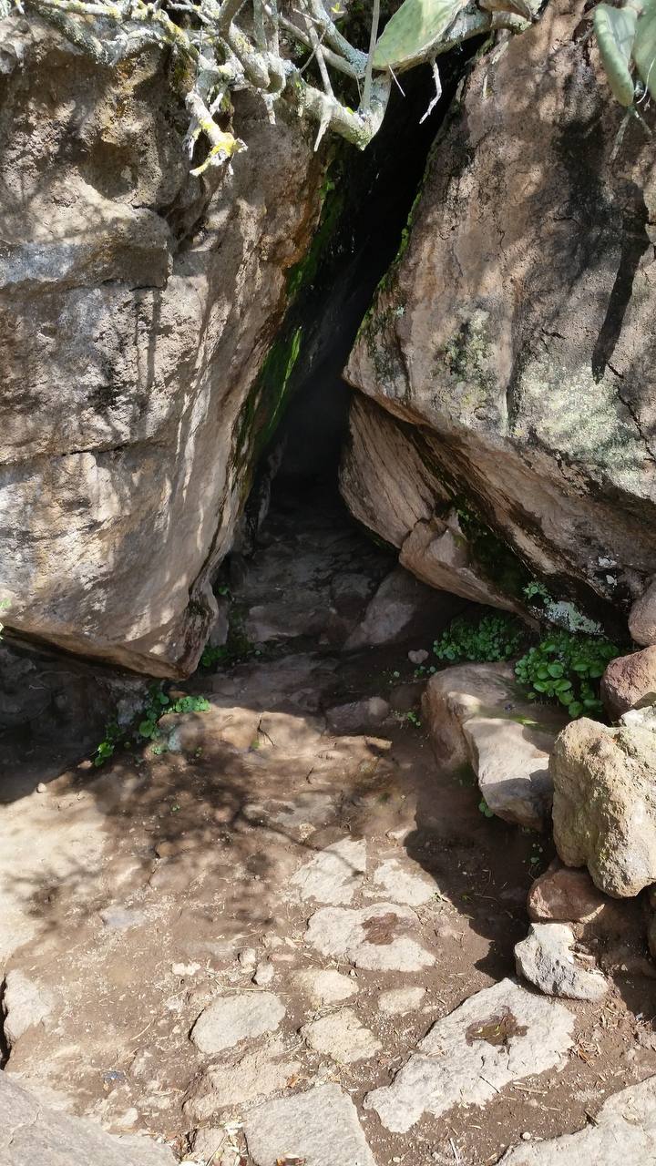 Benikulà cave in Pantelleria with natural steam rising from volcanic rocks