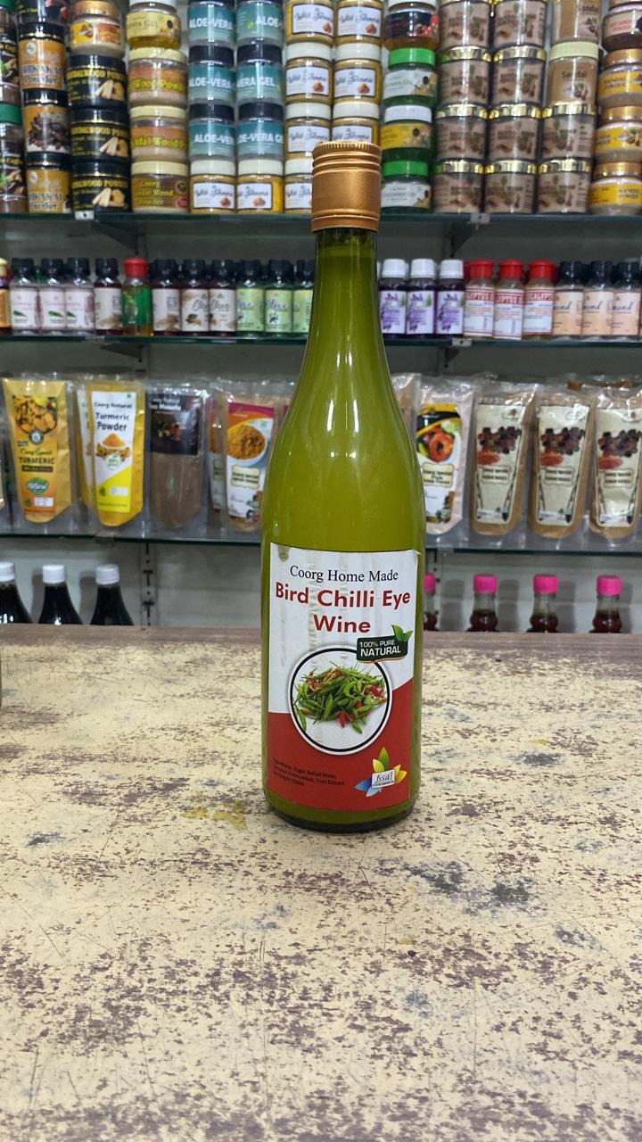 Authentic Coorg Bird's Eye Chili Wine bottle at Green Coorg Spices Corporation - Spicy homemade wine