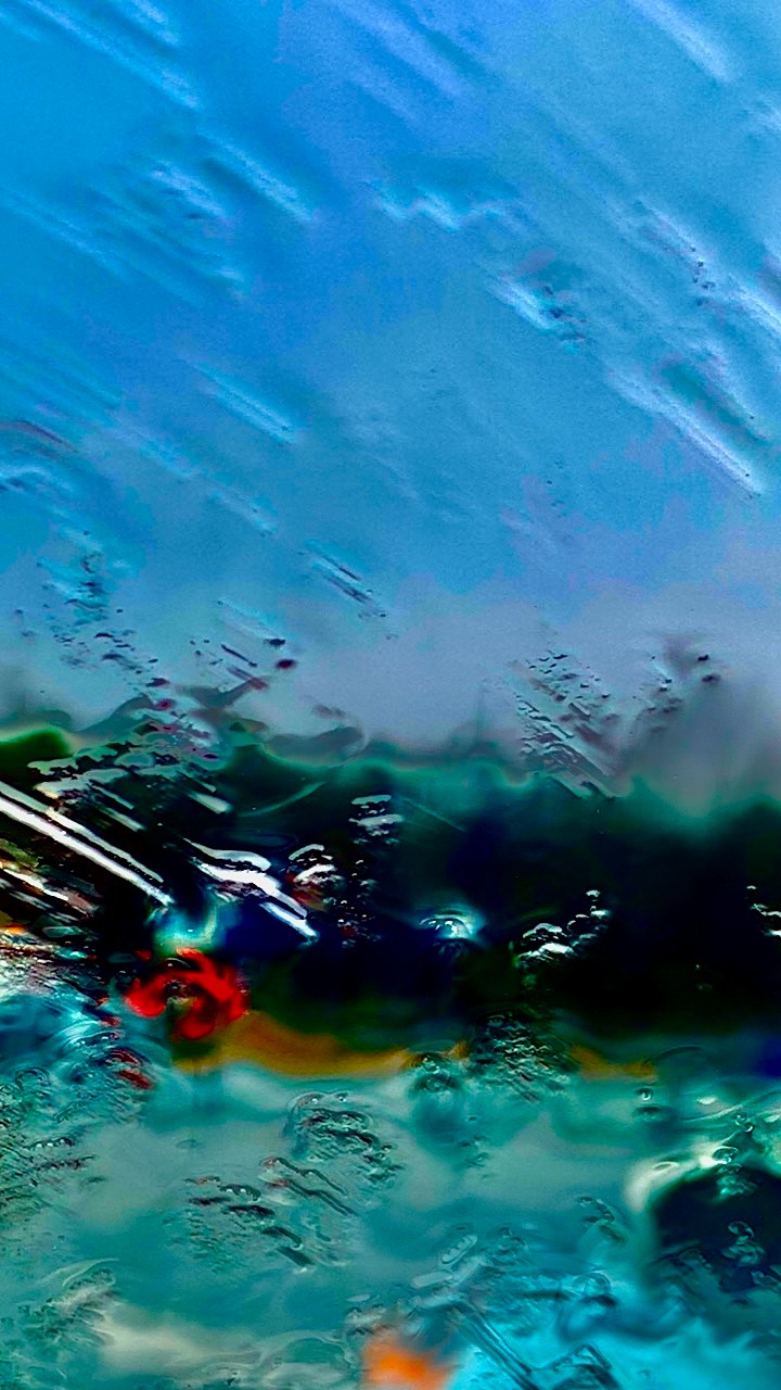 a surfer in the water with a surfboard