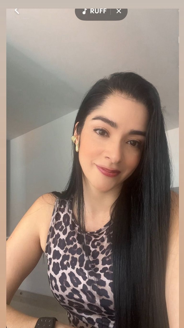 Professional psychologist smiling for a photo in formal wear