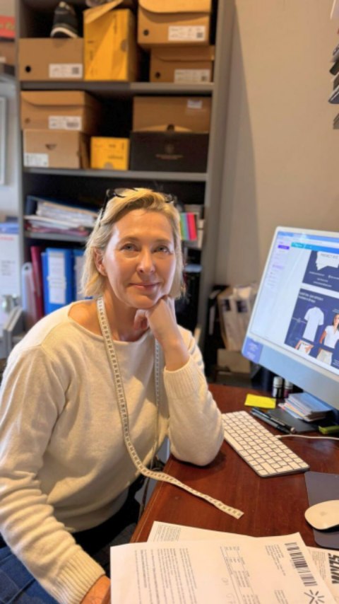 Female entrepreneur Lu working in her yacht uniform warehouse in Mougins, French Riviera