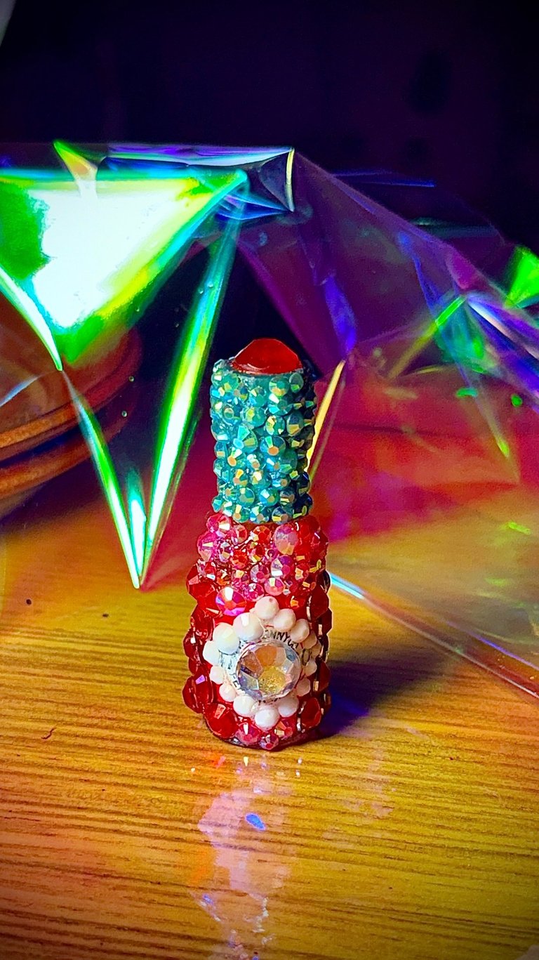 Mini Tabasco bottle covered in rhinestones