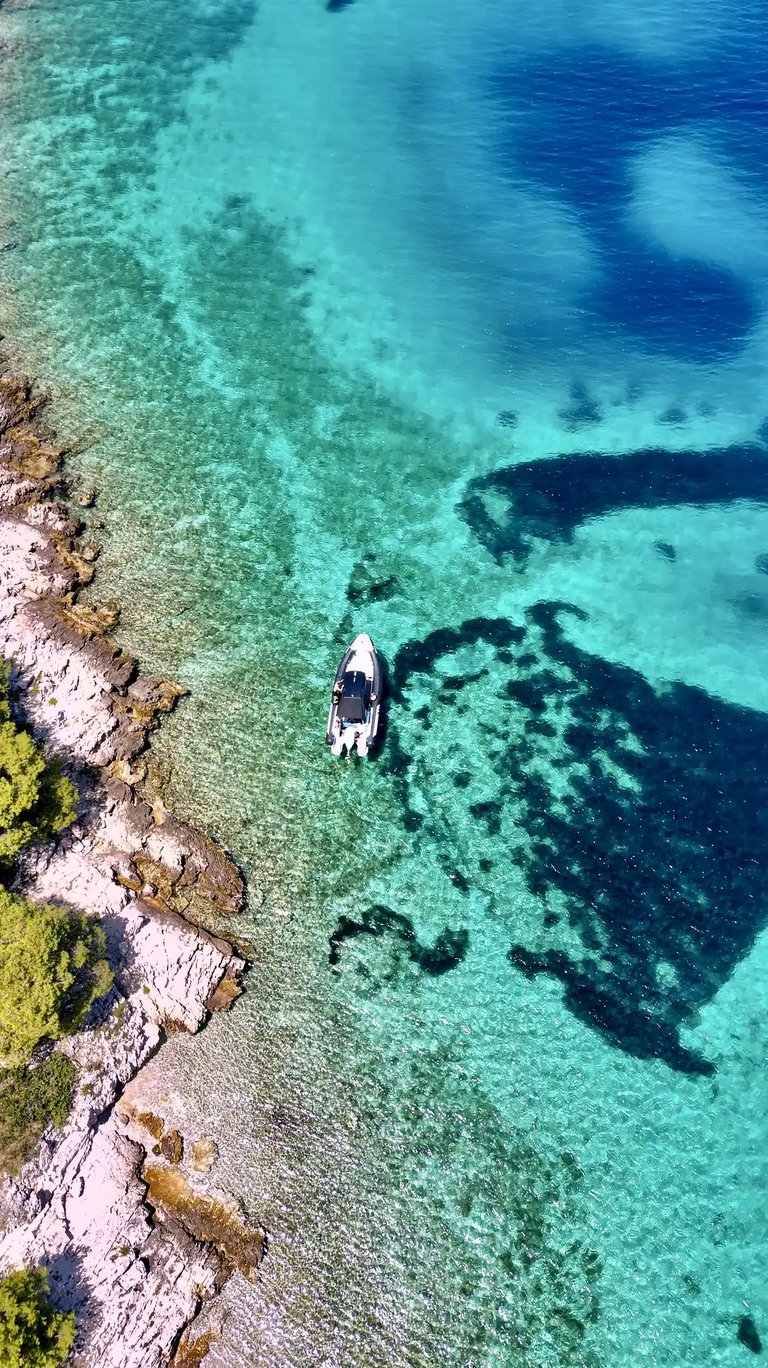 Aerial panoramic view of Drvenik Mali Island, seen on a private boat tour off the coast of Split, Croatia.