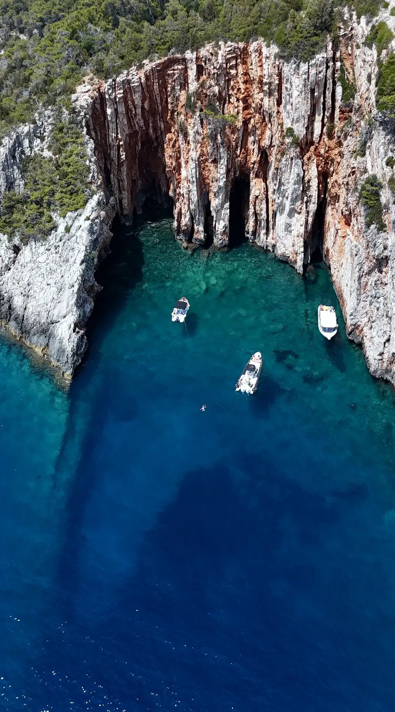 Aerial panoramic view of Red Rocks cliffs on the island of Hvar, taken during a private boat tour from Split