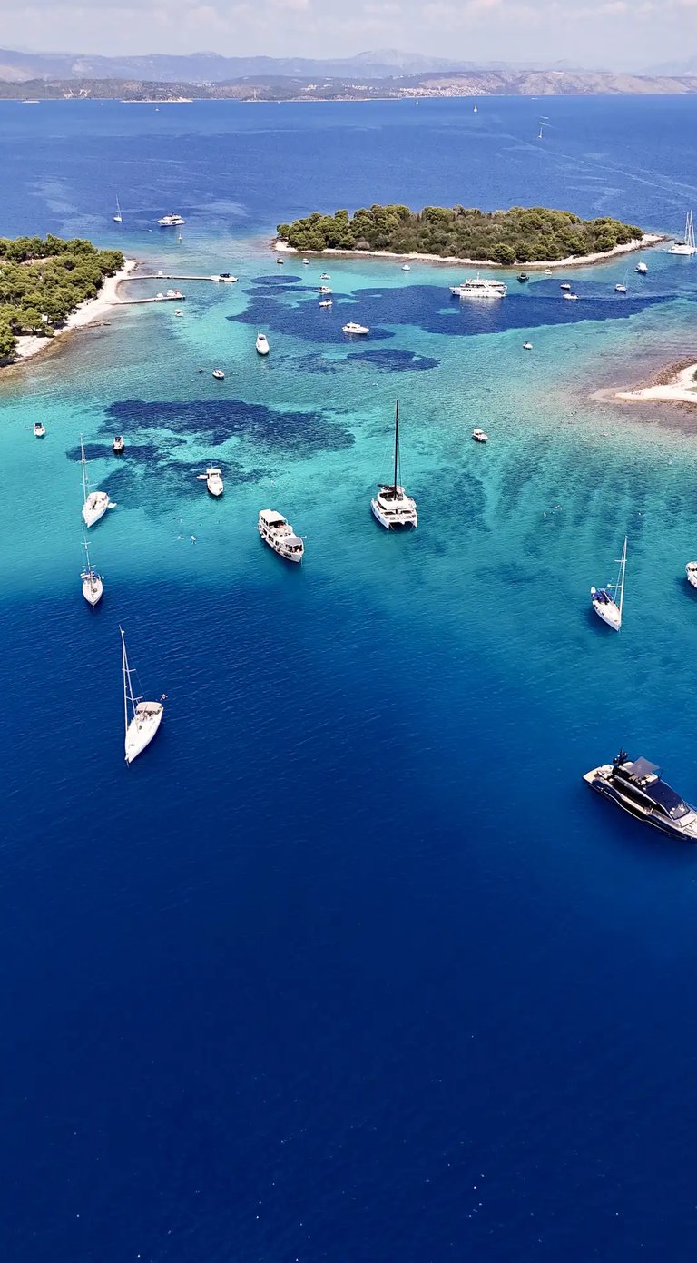 Aerial panoramic view of Blue Lagoon at Drvenik Veliki Island, seen on a private boat tour from Split, Croatia.