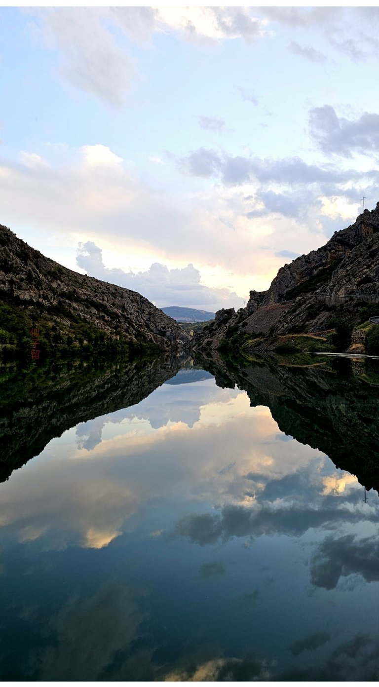 Nearly Perfect Mirror Reflection of the Embassament de Sopeira photographed by NIKORU