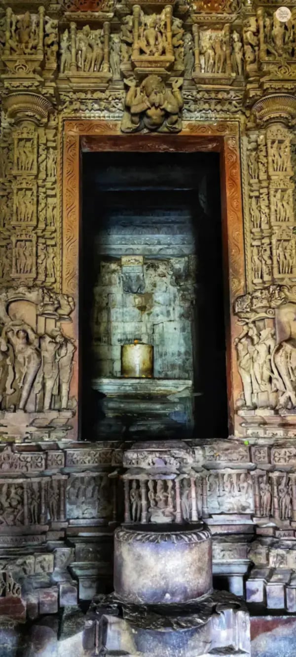Inner sanctum of Kandariya Mahadev Temple, Khajuraho with detailed stone architecture.