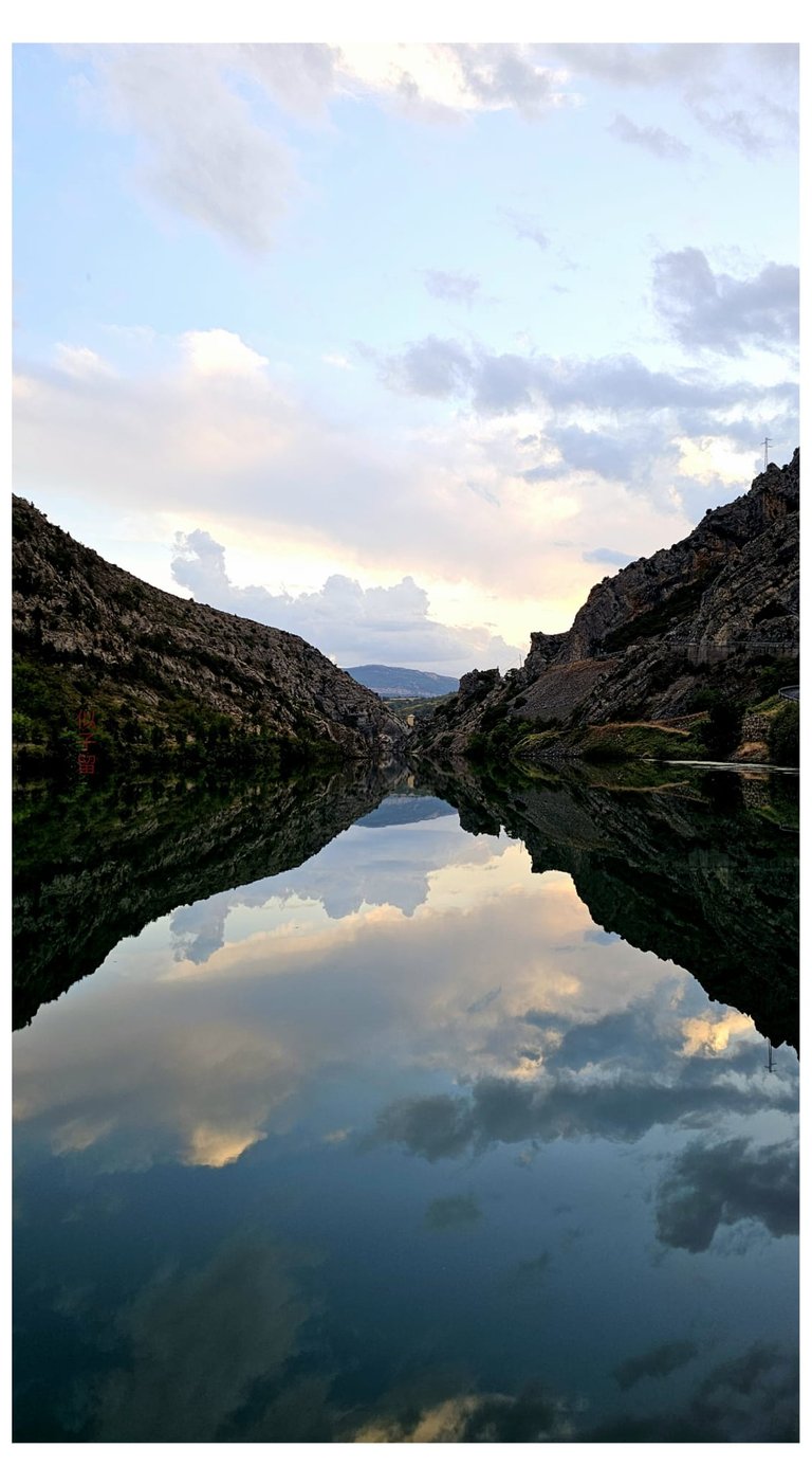 Nearly Perfect Mirror Reflection of the Embassament de Sopeira photographed by NIKORU