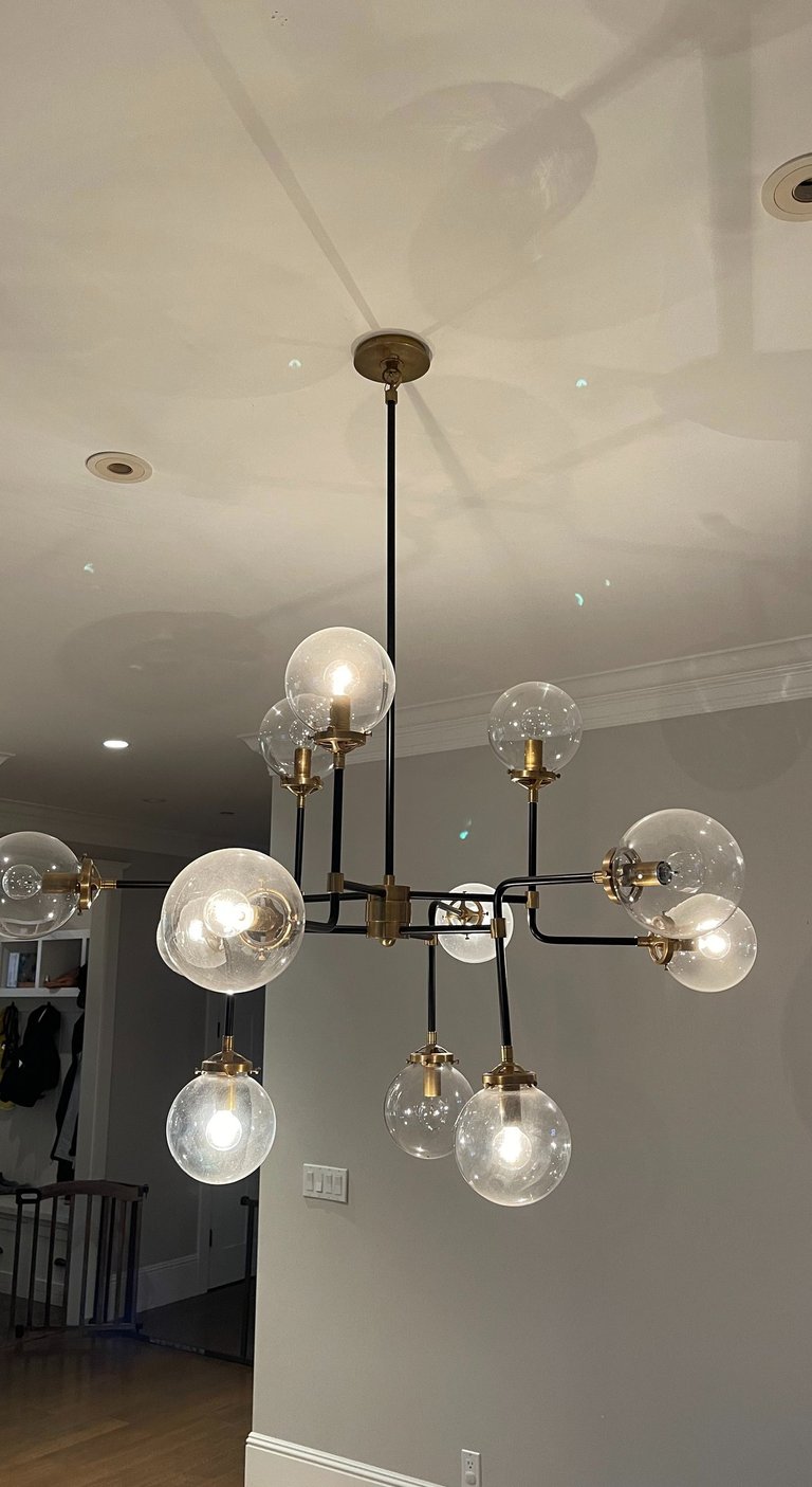 a chandelier with a chandelier hanging from the ceiling