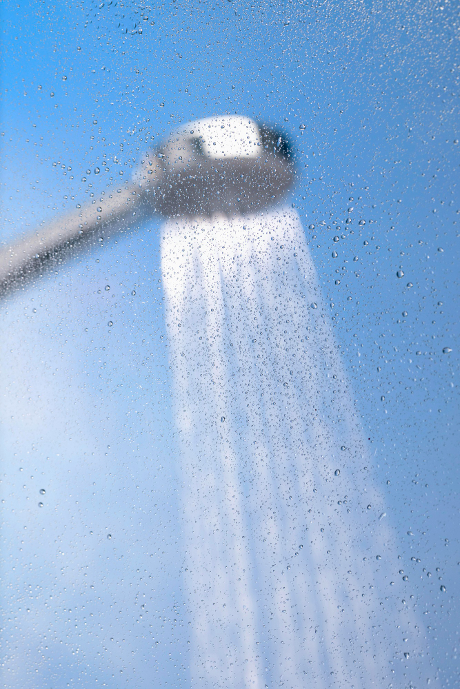 Blurred water spray and falling droplets background