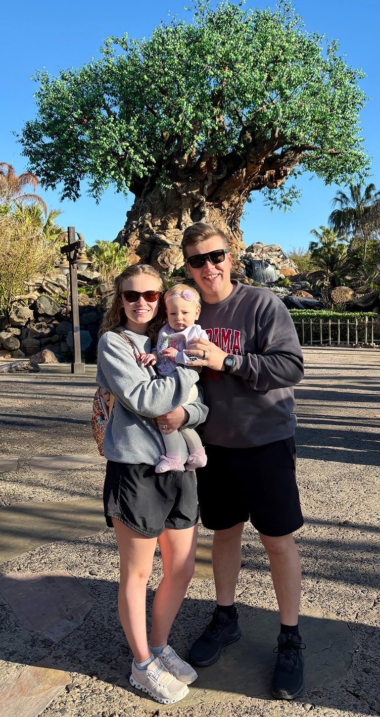 Payton King pictured with her family inside Disney's Animal Kingdom® Park at Walt Disney World®.