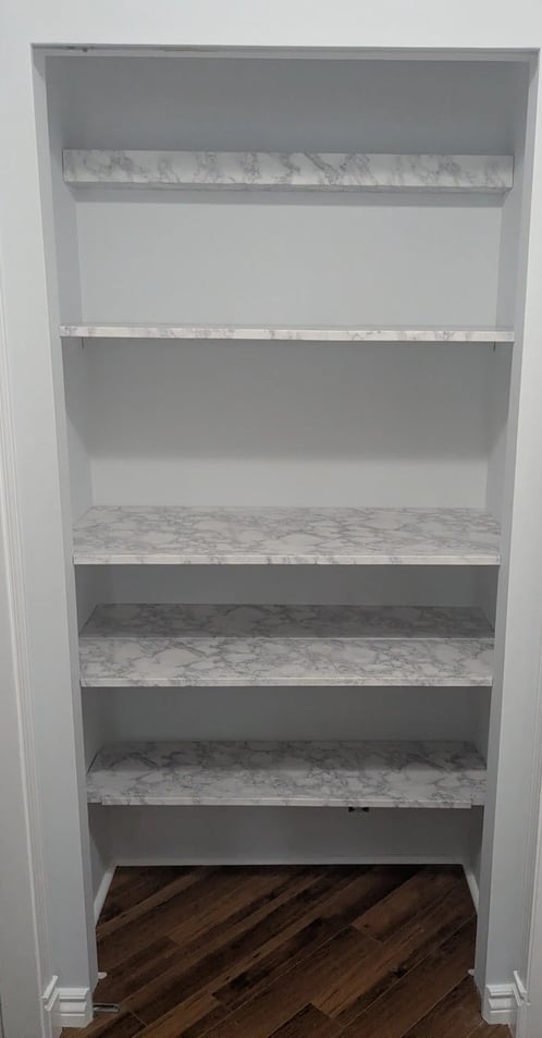 New kitcheware shelves installed, with shelf liner