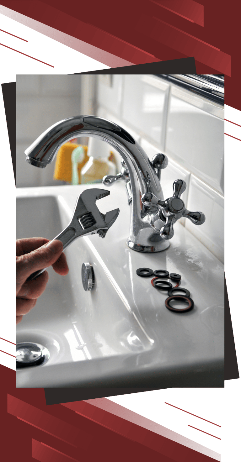 a person holding a wrenet in front of a sink