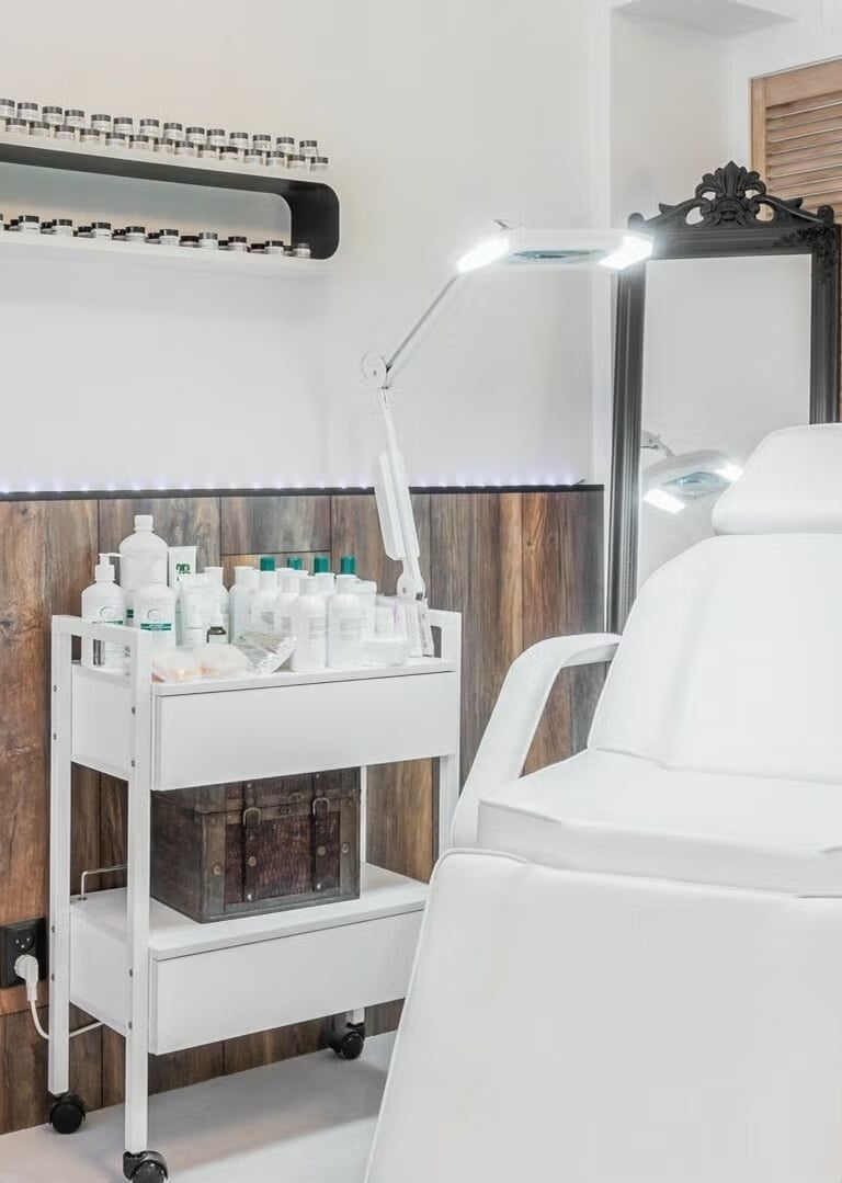 a salon salon chair with a hair dryer and a hair dryer
