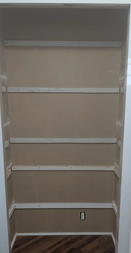 New shelf cleats in kitchenware closet