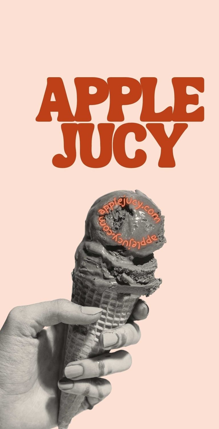 a person holding a cone with a cone shaped ice cream