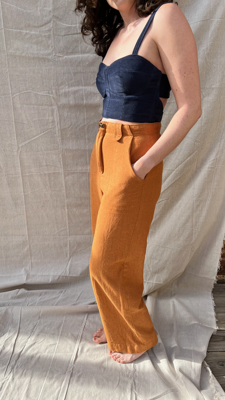 A navy corduroy bustier and honey brown flannel pants