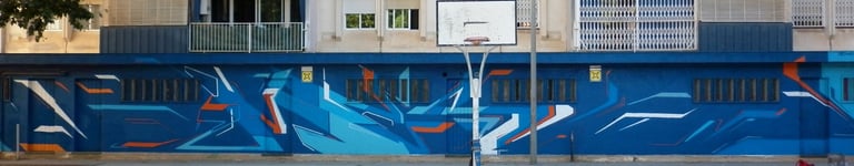 MES Ink graffiti mural en instituto Banús