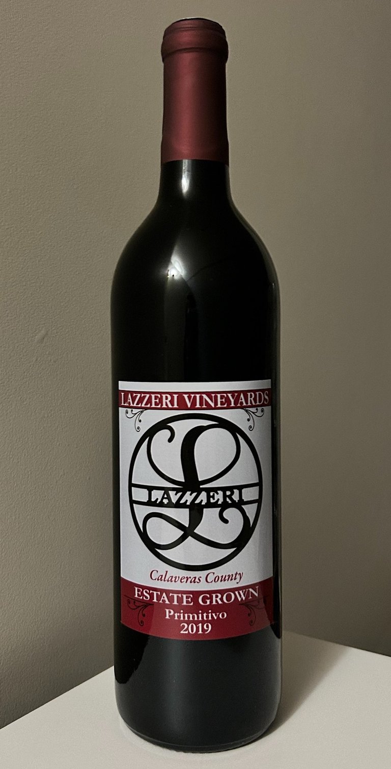 An unopened bottle of red wine.