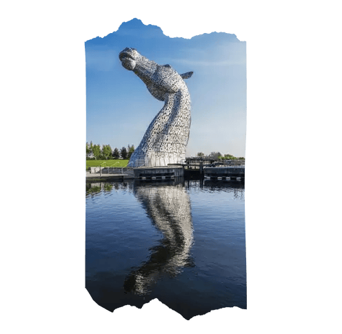 a large horse statue of a horse head reflecting in the water