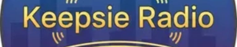 Keepsie Radio logo featuring a yellow bridge and city skyline on a blue circular background.